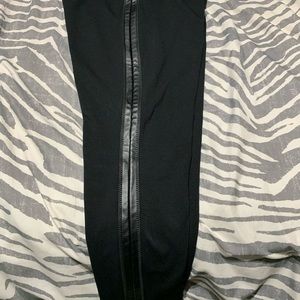 Leggings with leather detail down side